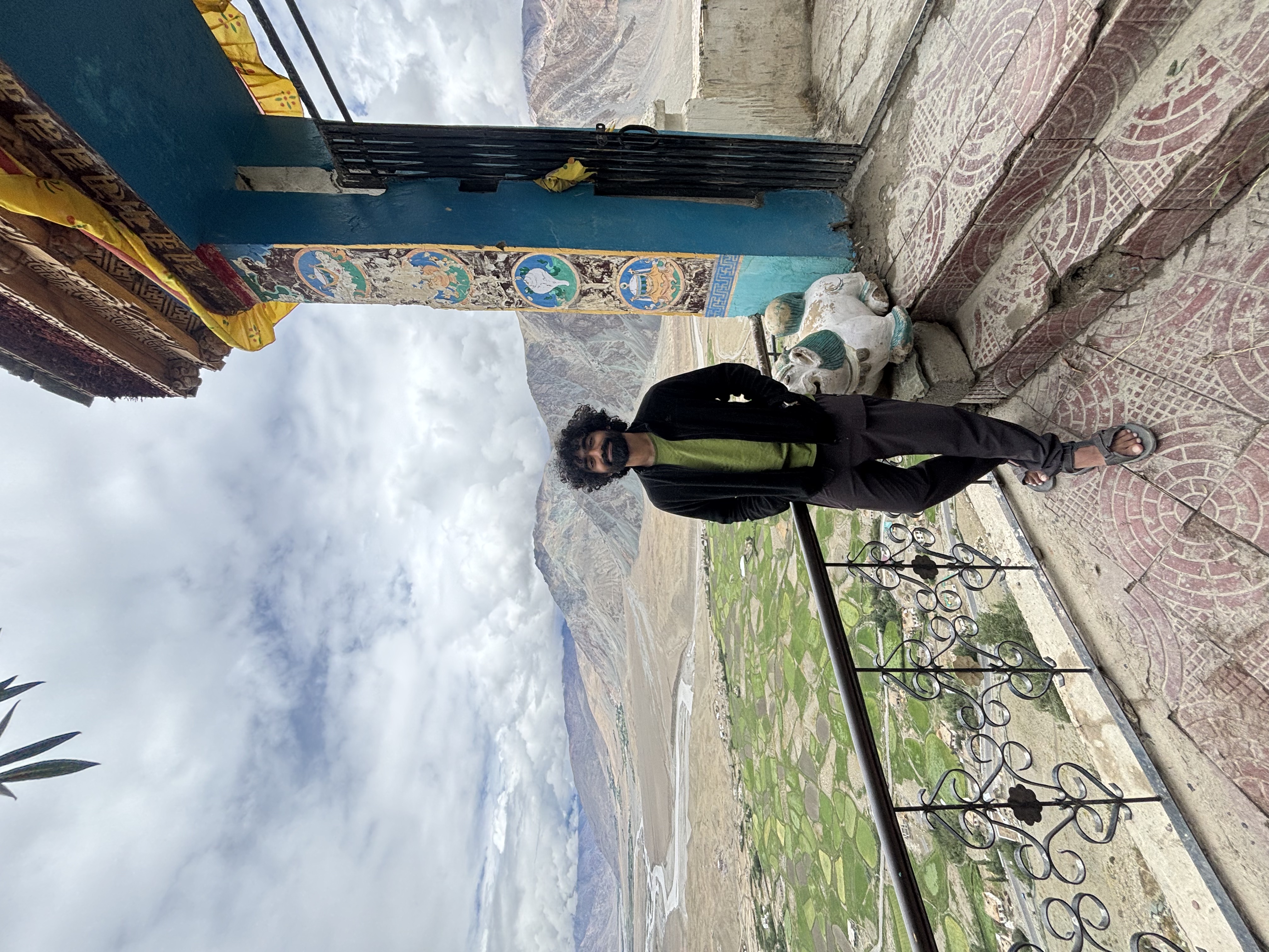 Nishanth overlooking a mountain valley